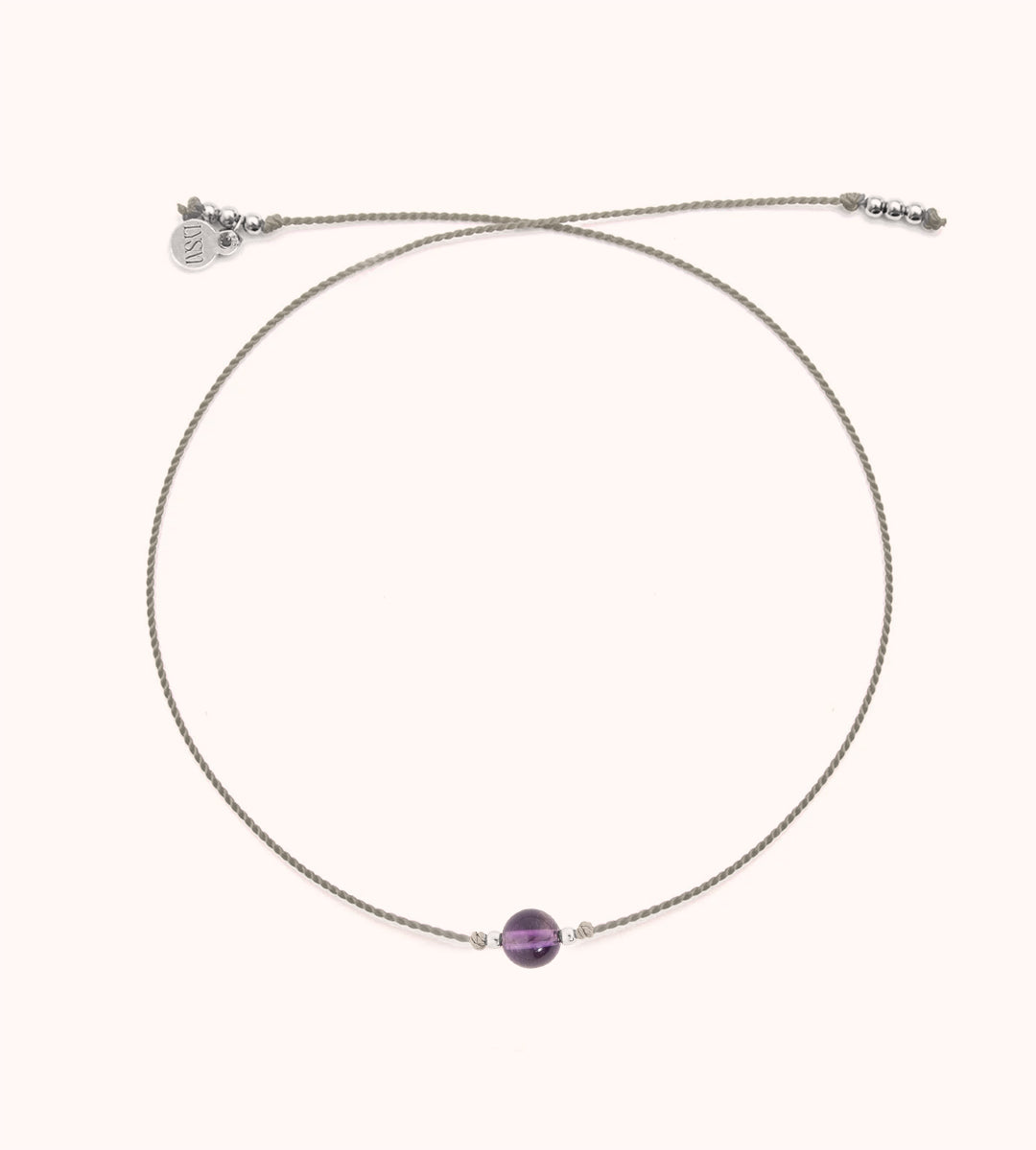 Glücksarmband mit runden Amethyst dem Stein der Ruhe